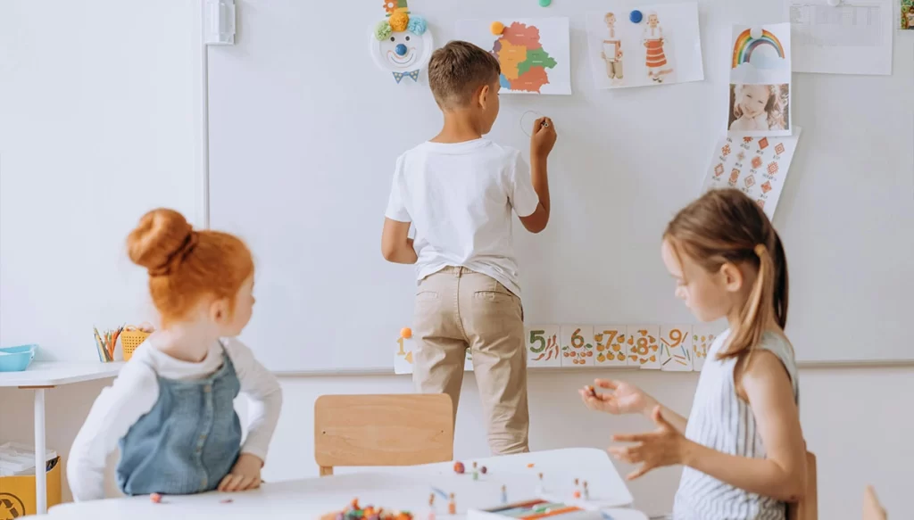 children of different ages in a classroom